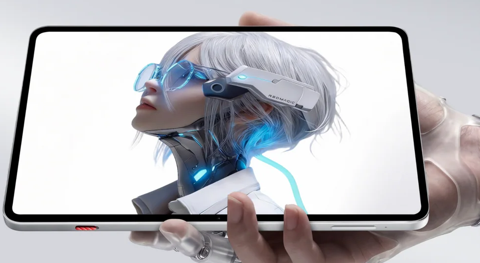 White REDMAGIC gaming tablet with an OLED display showcasing vibrant cyberpunk visuals.